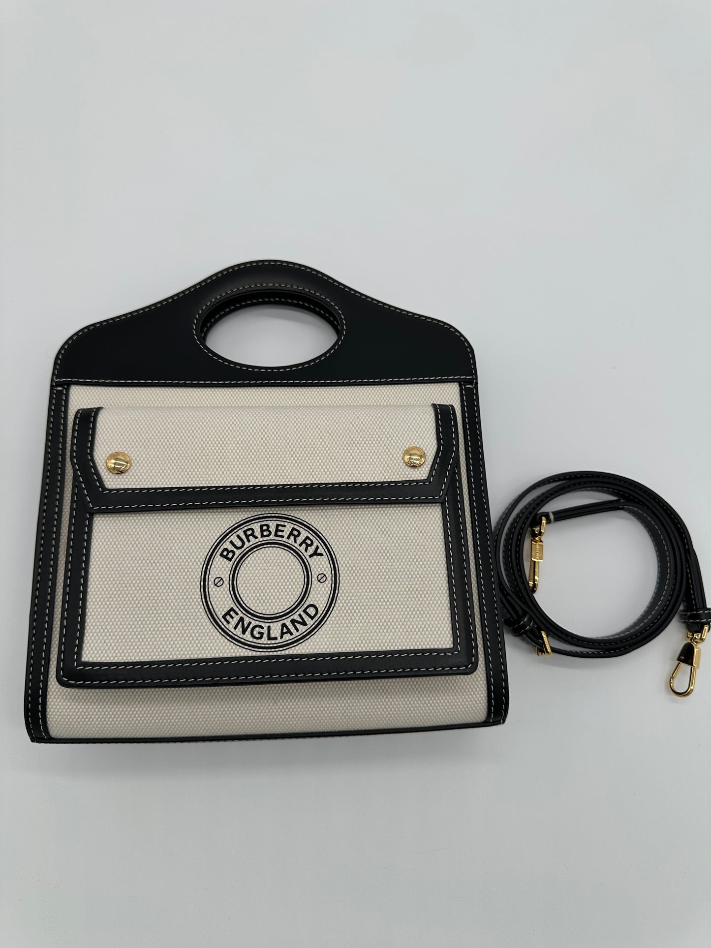 Luxury Soluciens Pre-owned Burberry mini pocket bag in black leather trim/canvas