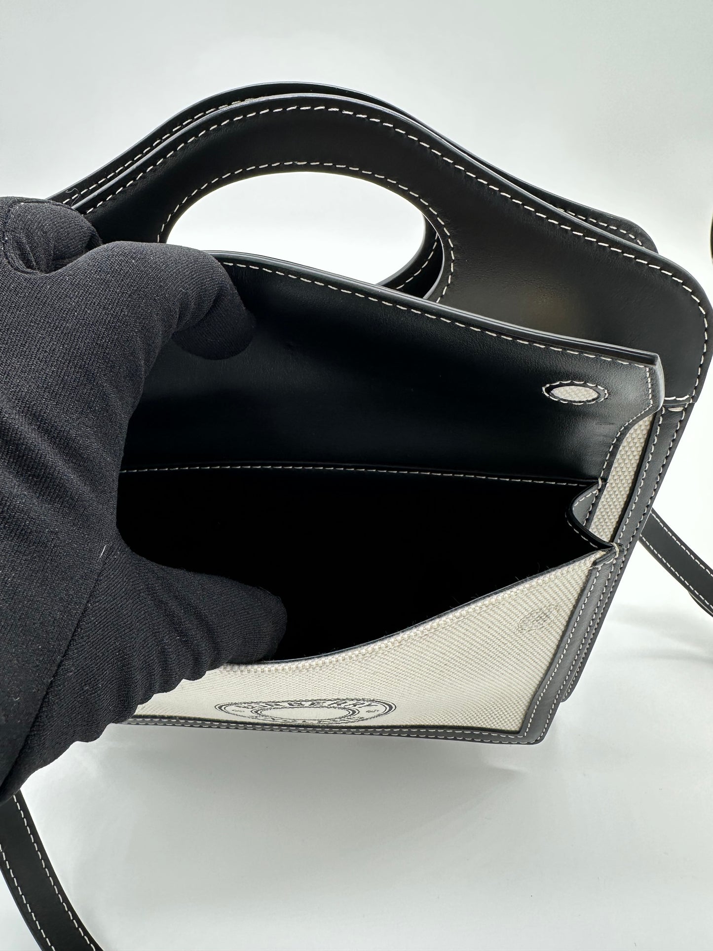 Luxury Soluciens Pre-owned Burberry mini pocket bag in black leather trim/canvas