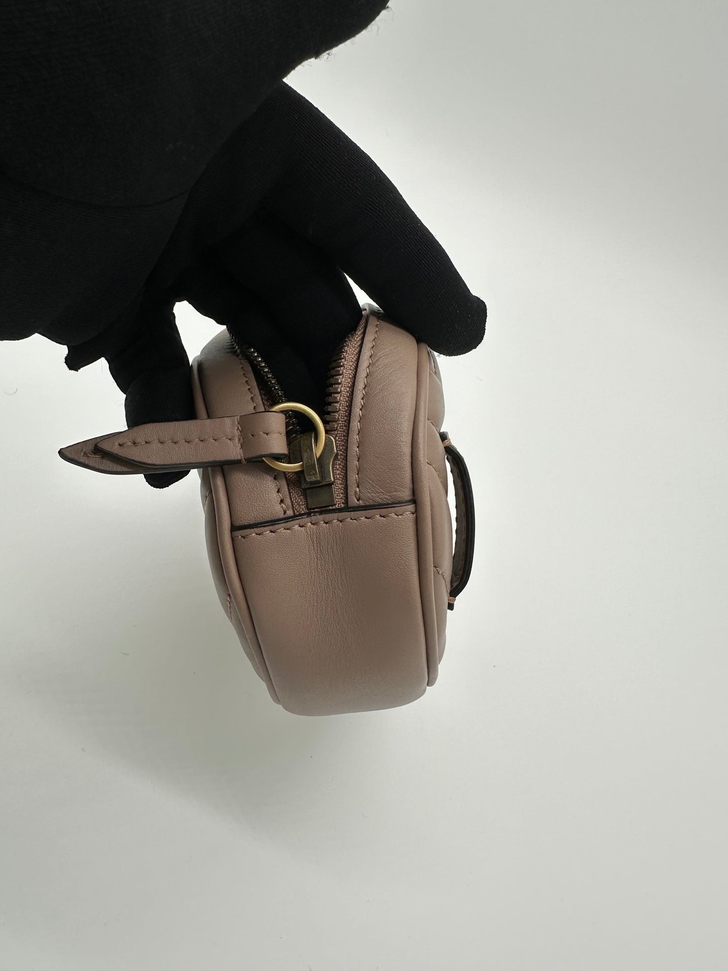 Luxury Soluciens Pre-owned Gucci beige leather Marmont belt bag with antiqued bronze hardware