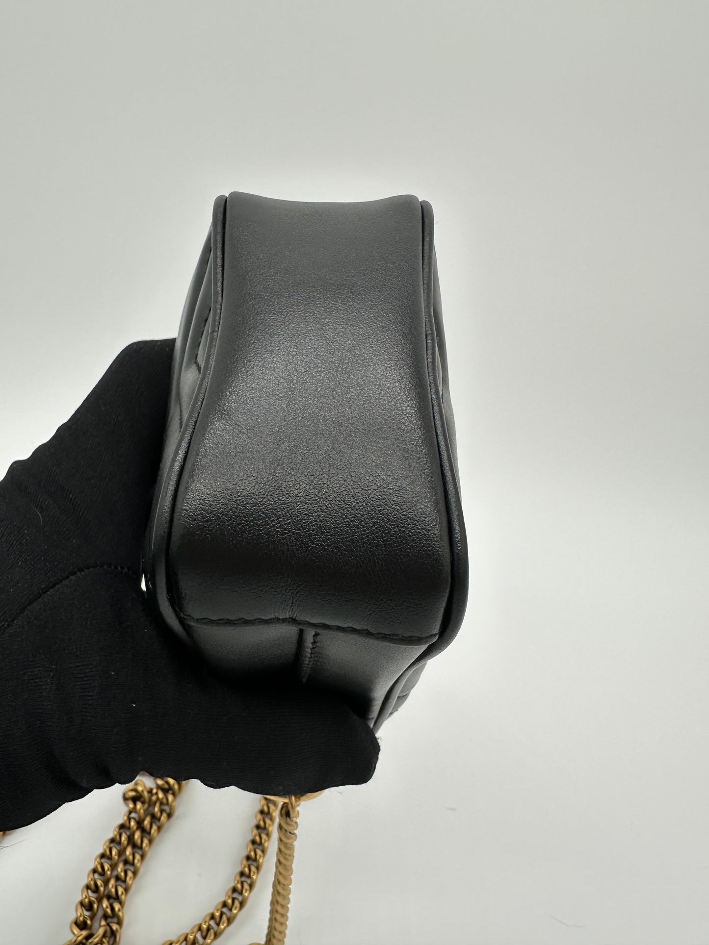 Luxury Soluciens Pre-owned Gucci Black leather Marmont phone bag with antiqued gold tone hardware