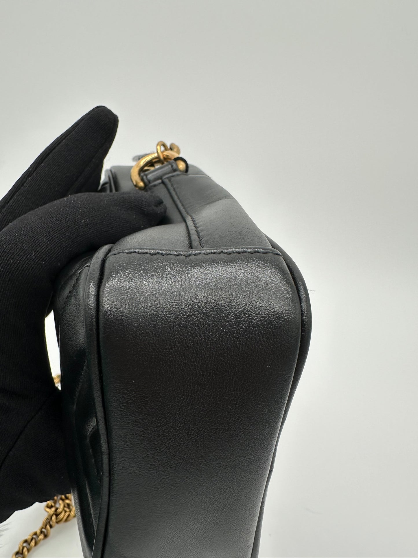 Luxury Soluciens Pre-owned Gucci Black leather Marmont phone bag with antiqued gold tone hardware