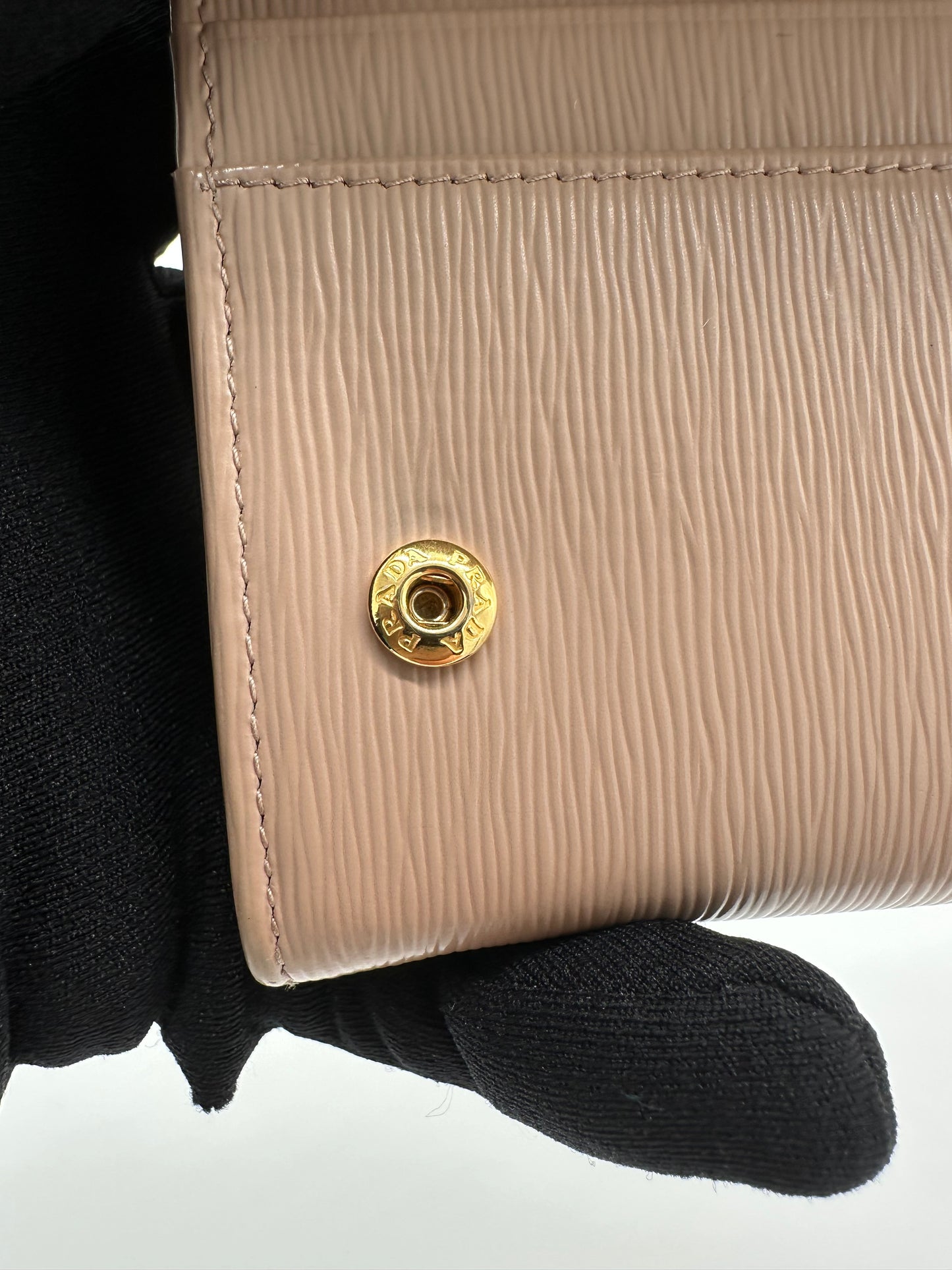 Luxury Soluciens Pre-owned Prada beige grained leather flap wallet