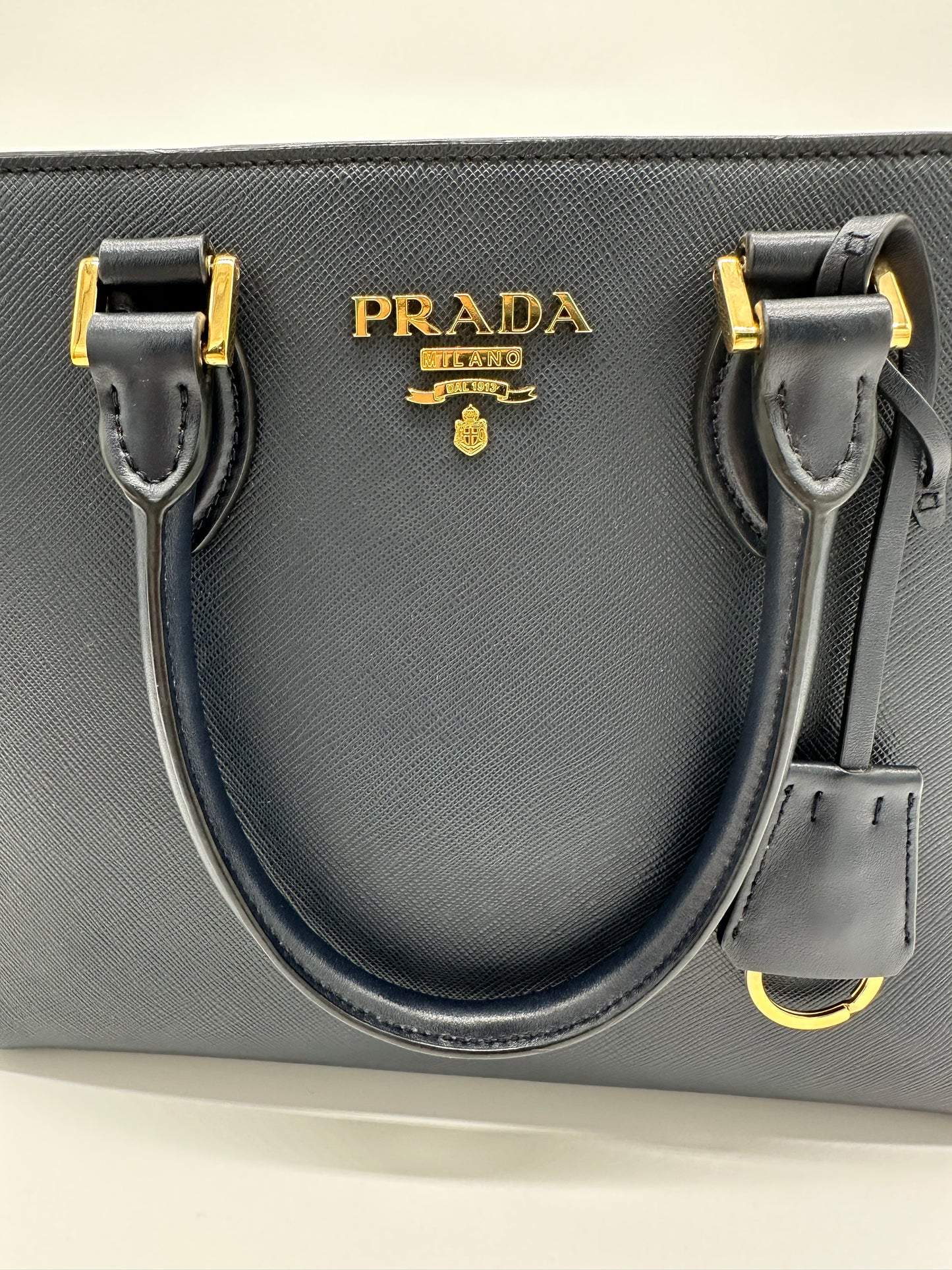 Luxury Soluciens Pre-owned Prada Blue saffiano leather tote with cross body strap and gold toned hardware