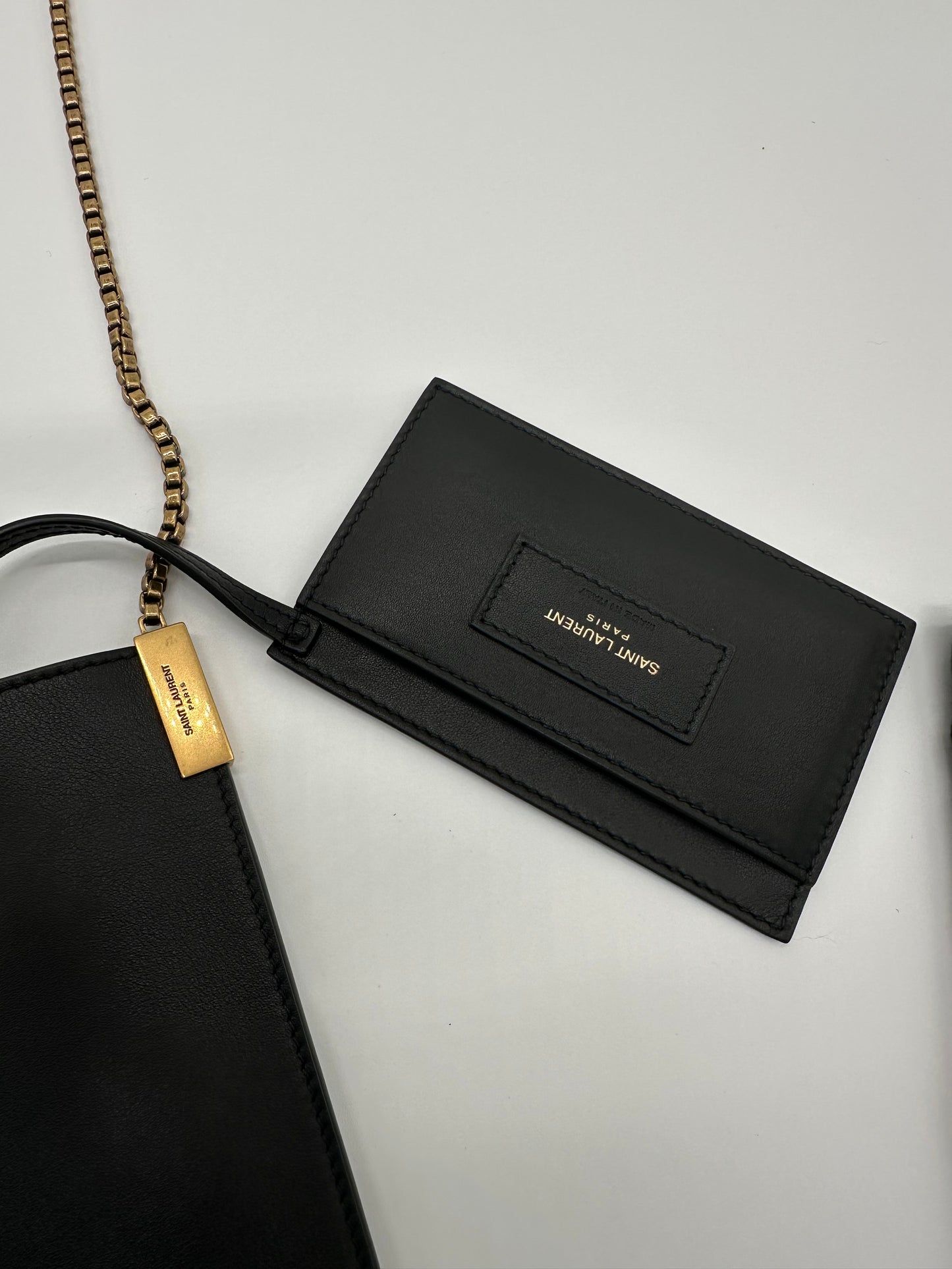 Luxury Soluciens Pre-owned YSL black leather bucket bag small with box chain in brushed bronze
