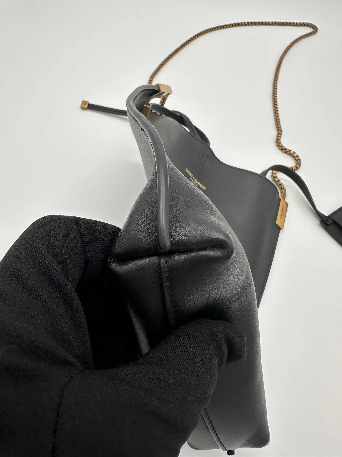 Luxury Soluciens Pre-owned YSL black leather bucket bag small with box chain in brushed bronze