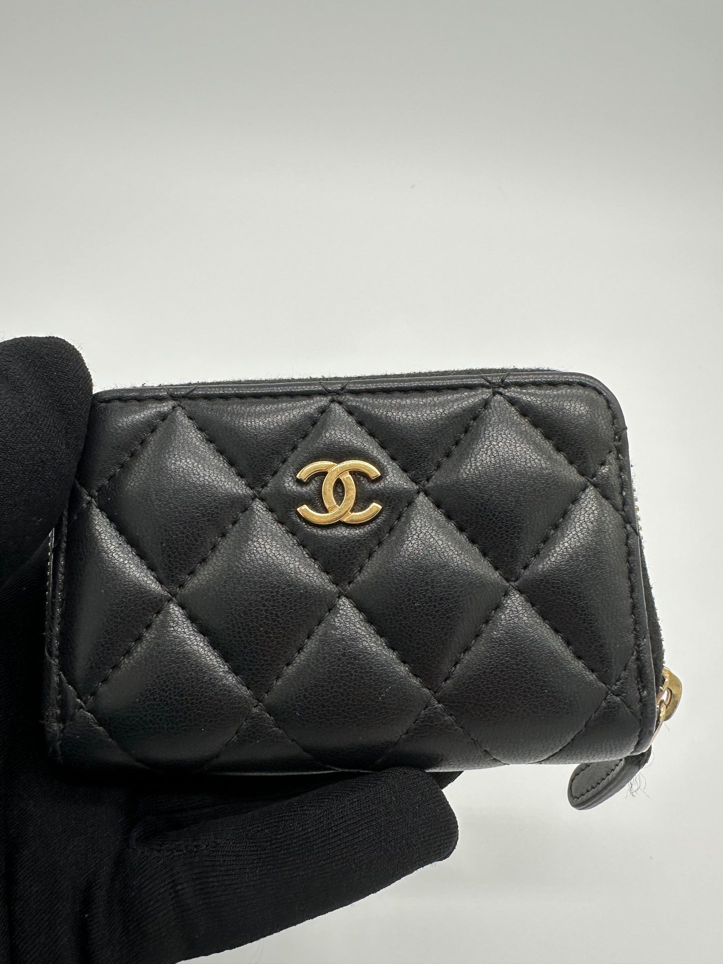 Luxury Soluciens Pre-owned Chanel black small zippy card wallet in lambskin with gold tone hard ware