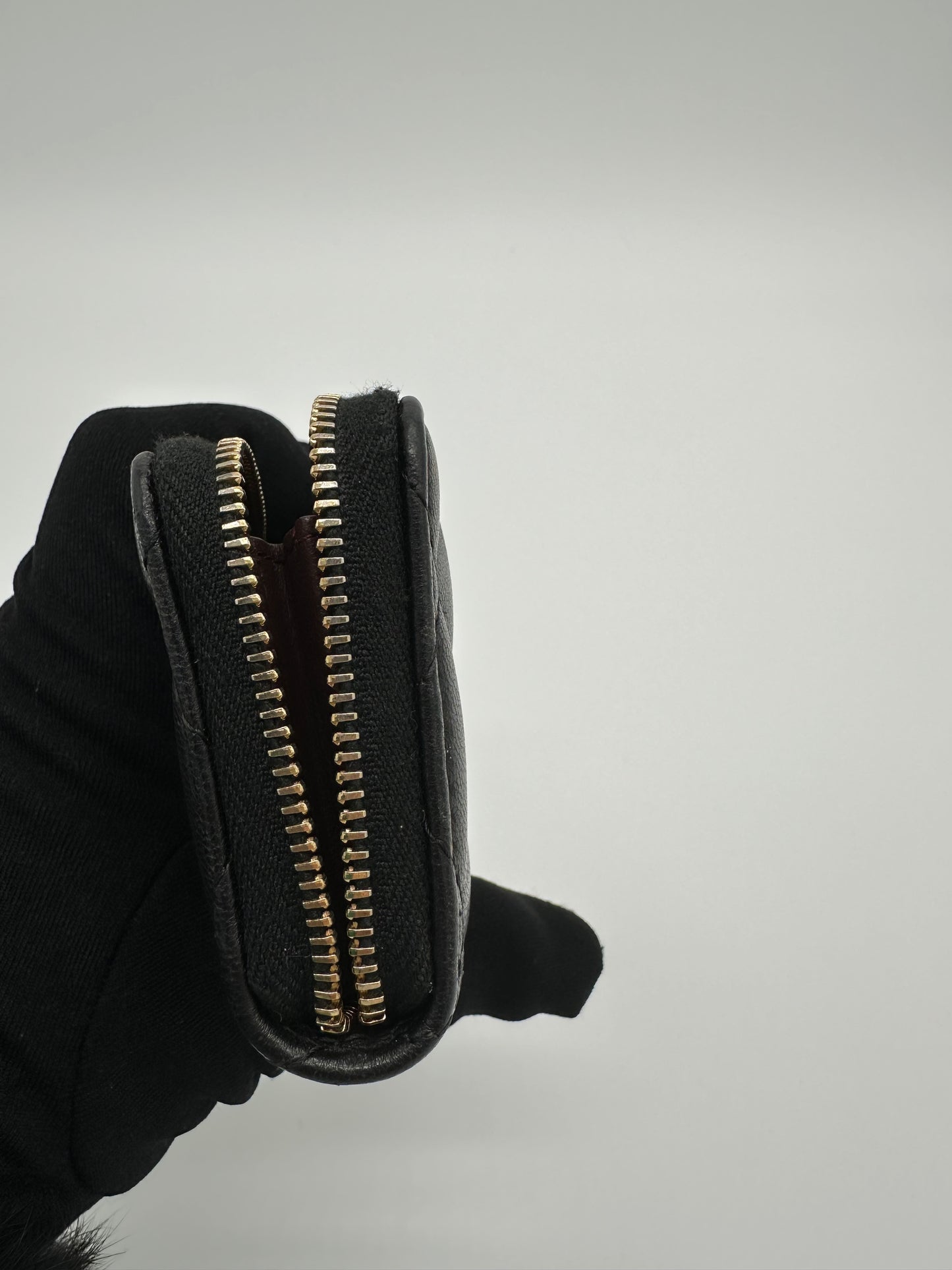 Luxury Soluciens Pre-owned Chanel black small zippy card wallet in lambskin with gold tone hard ware