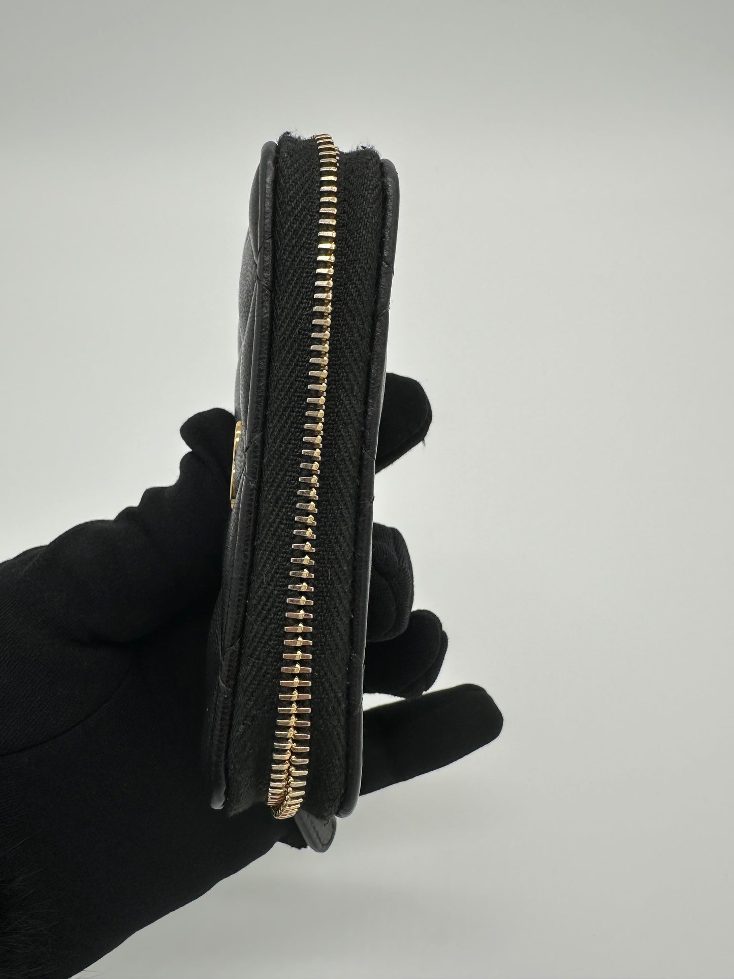 Luxury Soluciens Pre-owned Chanel black small zippy card wallet in lambskin with gold tone hard ware