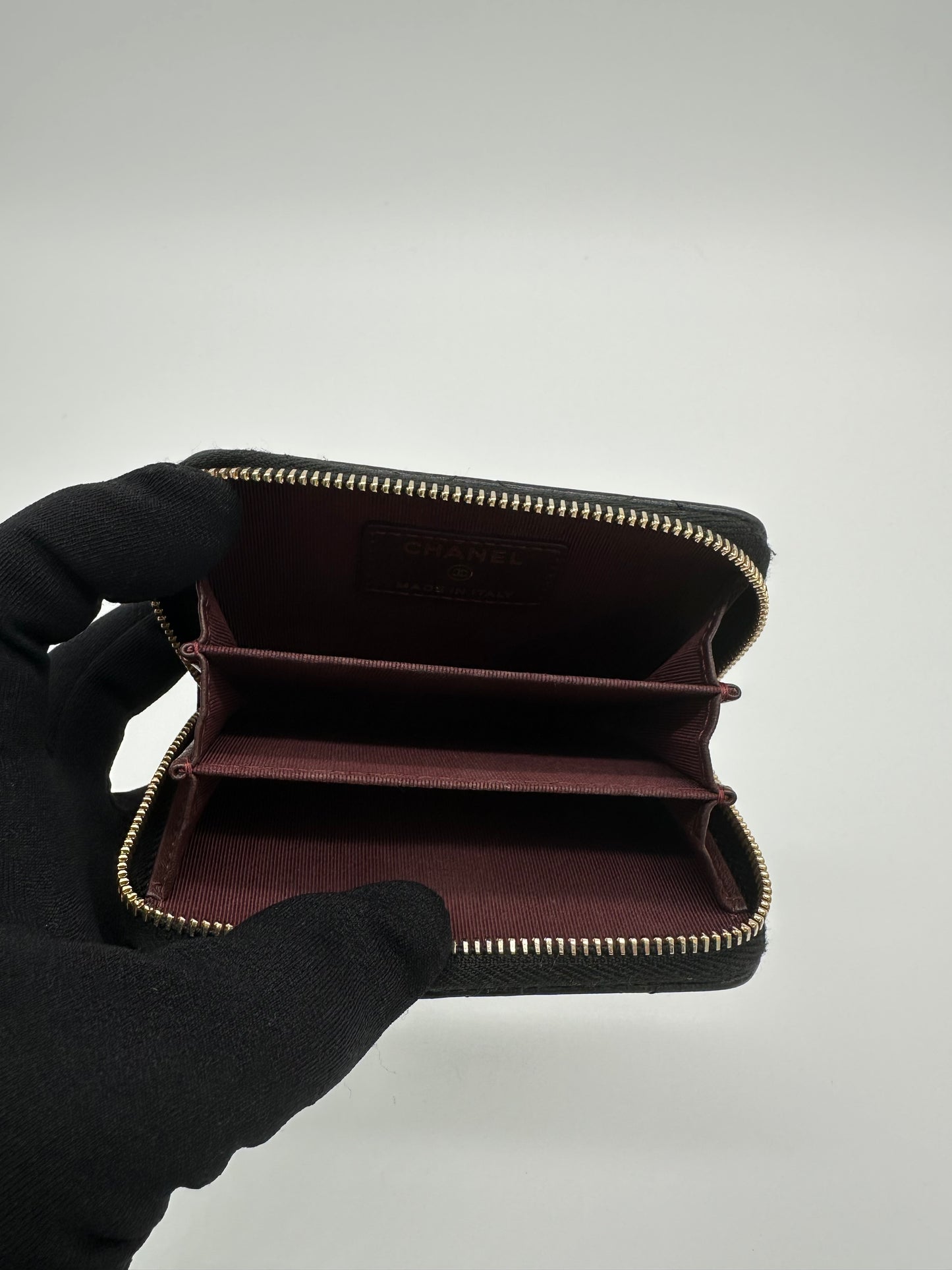 Luxury Soluciens Pre-owned Chanel black small zippy card wallet in lambskin with gold tone hard ware