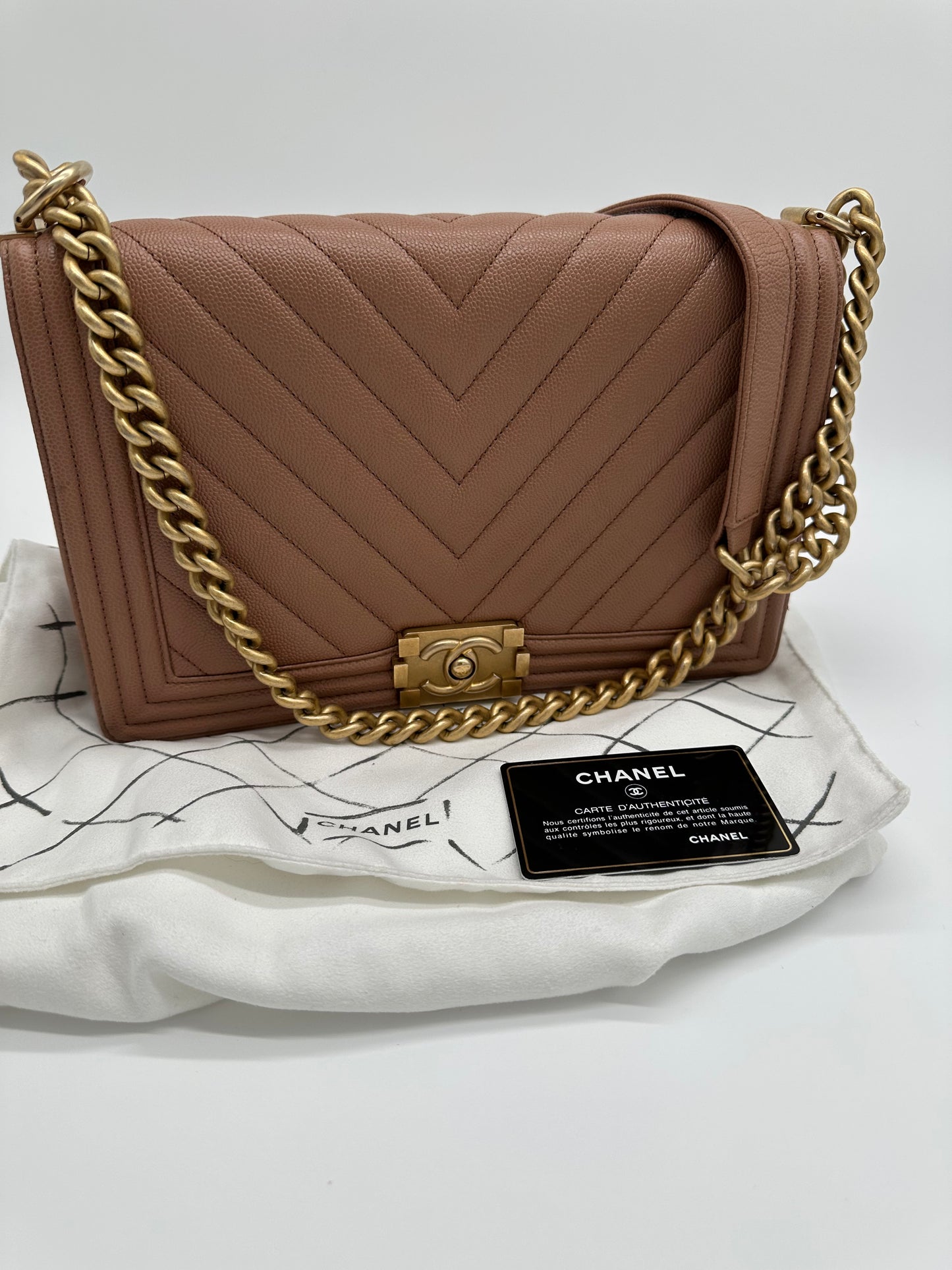 Luxury Soluciens Pre-owned Chanel boy bag in dark beige caviar leather