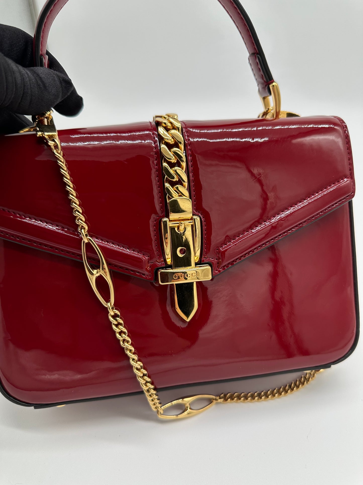 Luxury Soluciens Pre-Owned Gucci Sylvie 1969 Deep Red Patent Leather Bag