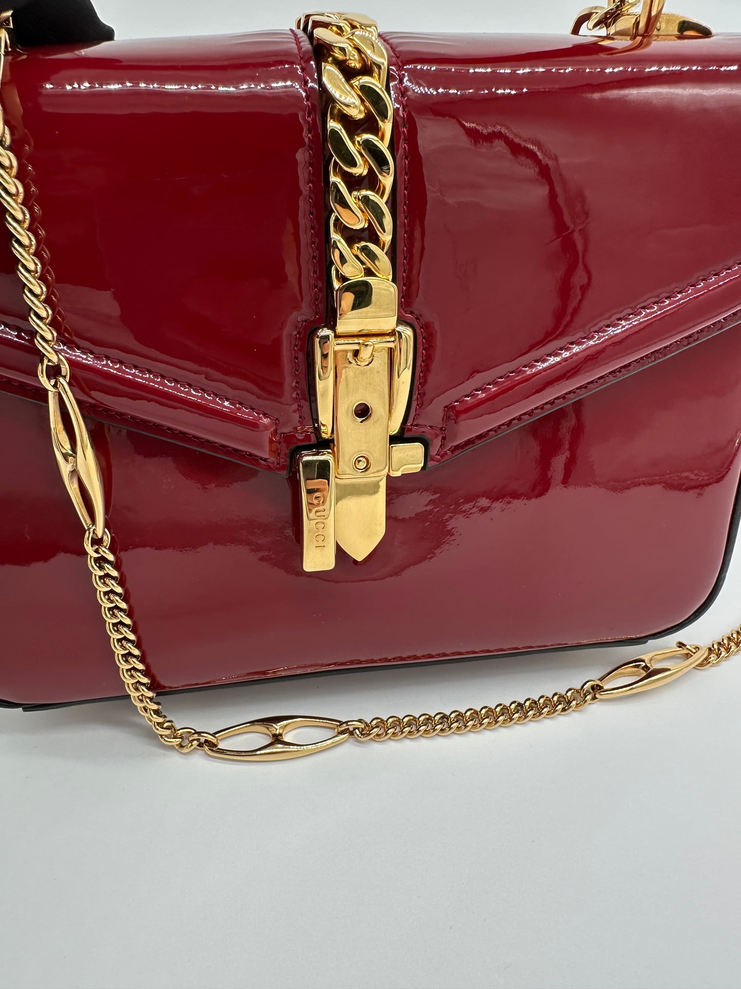 Luxury Soluciens Pre-Owned Gucci Sylvie 1969 Deep Red Patent Leather Bag