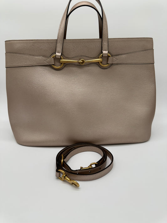 Luxury Soluciens Pre-owned Gucci metallic gold/silver tote with cross body strap