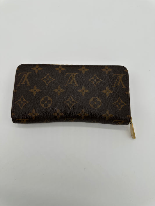 Luxury Soluciens Pre-owned Louis Vuitton monogram canvas zippy wallet